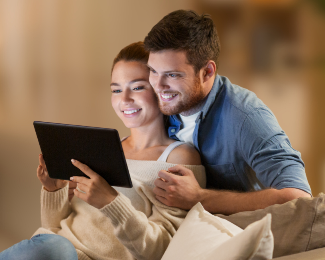Parents looking at a tablet